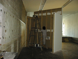 Behind the wall